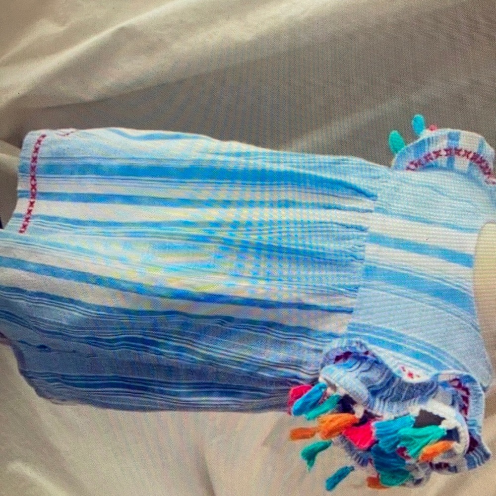 Charming features colorful striped blouse